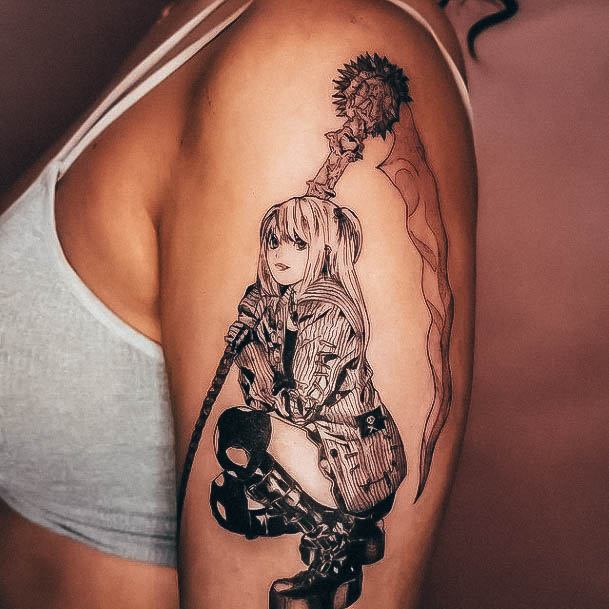 Decorative Anime Tattoo On Female