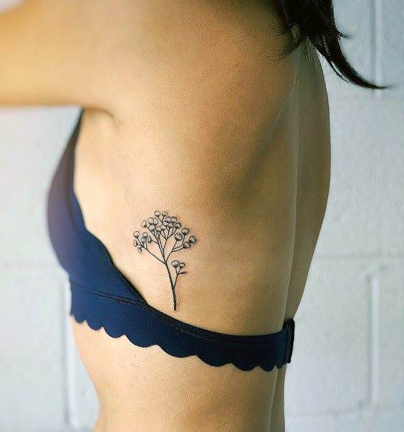 Decorative Babys Breath Tattoo On Female