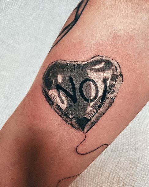 Decorative Ballon Tattoo On Female