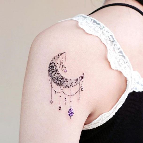 Decorative Bicep Tattoo On Female