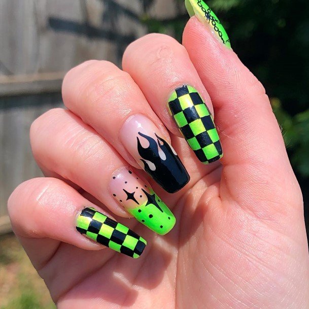 Decorative Black And Green Nail On Female