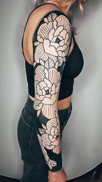 Decorative Blackout Tattoo On Female