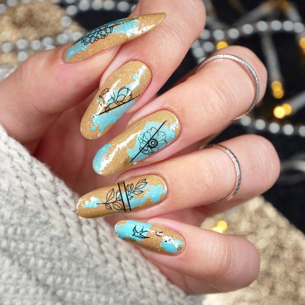 Decorative Blue And Gold Nail On Female