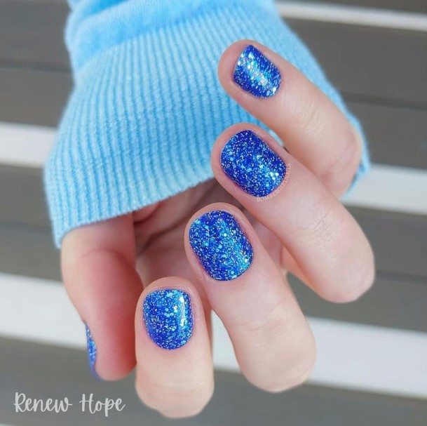 Decorative Blue Glitter Nail On Female