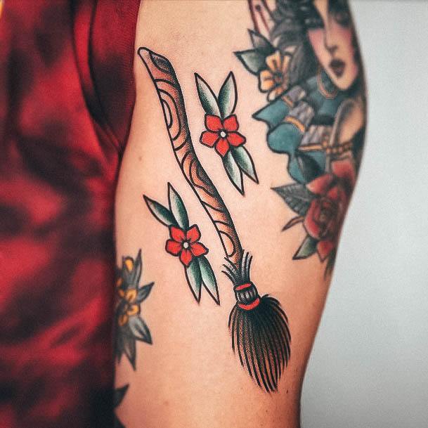 Decorative Broom Tattoo On Female