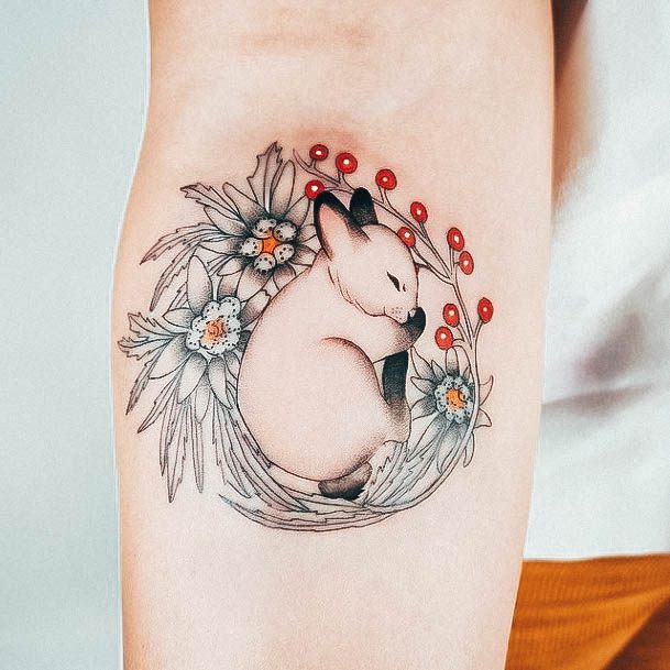 Decorative Bunny Rabbit Tattoo On Female