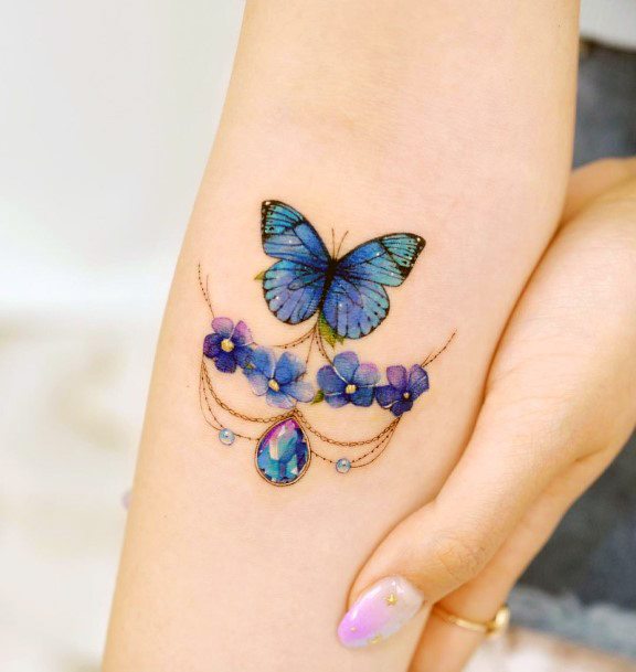 Decorative Butterfly Flower Tattoo On Female
