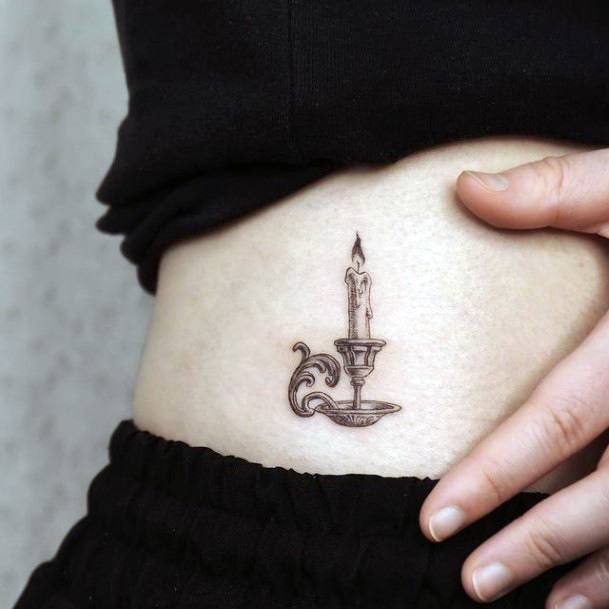 Decorative Candle Tattoo On Female