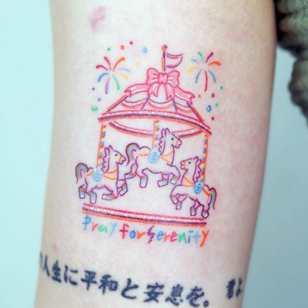 Decorative Carousel Tattoo On Female