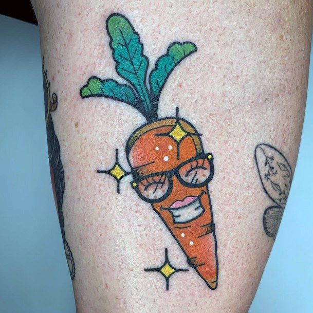 Decorative Carrot Tattoo On Female