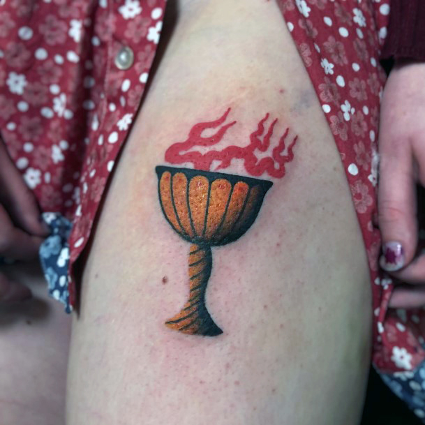 Decorative Chalice Tattoo On Female