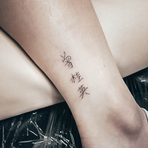 Decorative Chinese Tattoo On Female