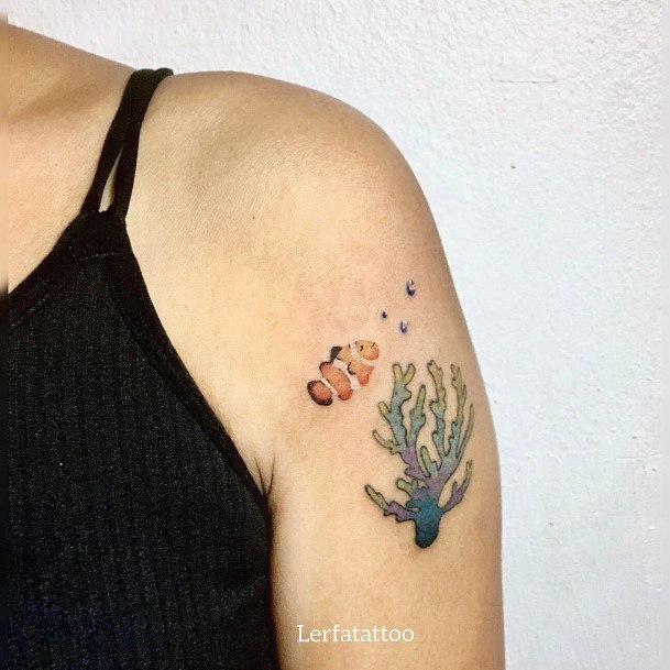 Decorative Clown Fish Tattoo On Female