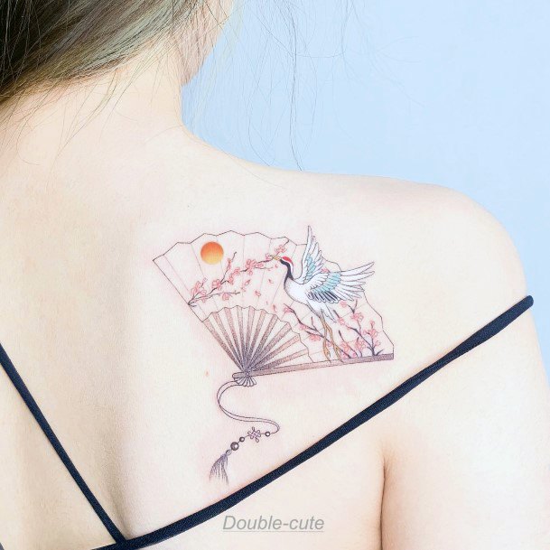 Decorative Crane Tattoo On Female