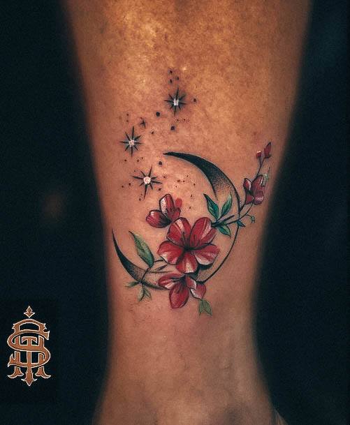 Decorative Cresent Moon Tattoo On Female