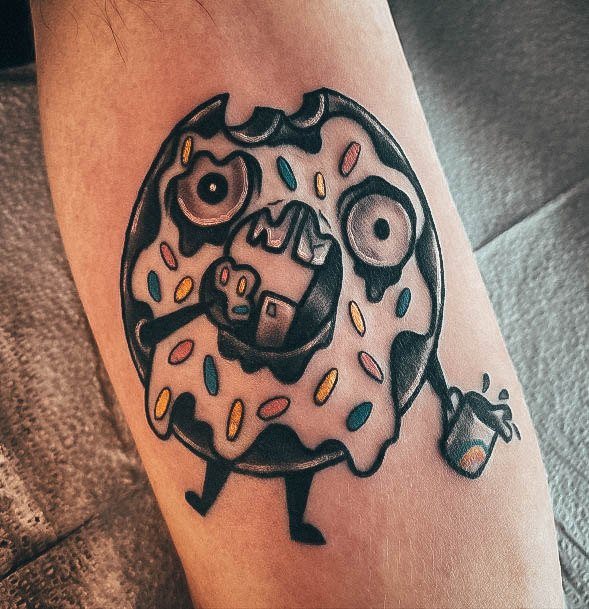 Decorative Donut Tattoo On Female