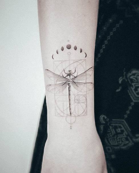 Decorative Dragonfly Tattoo On Female Wrist