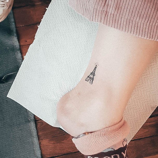 Decorative Eiffel Tower Tattoo On Female