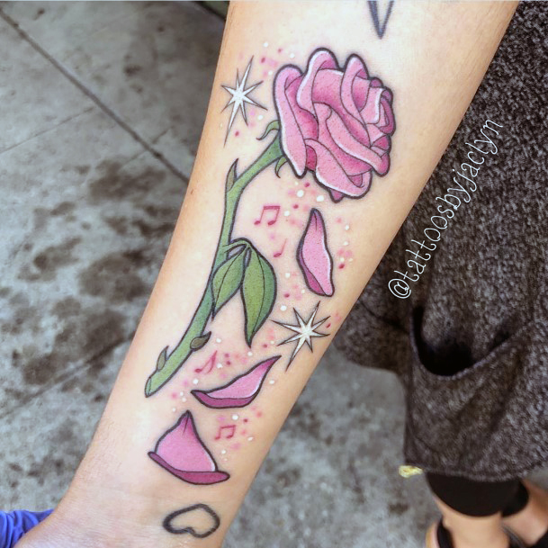 Decorative Enchanted Rose Tattoo On Female