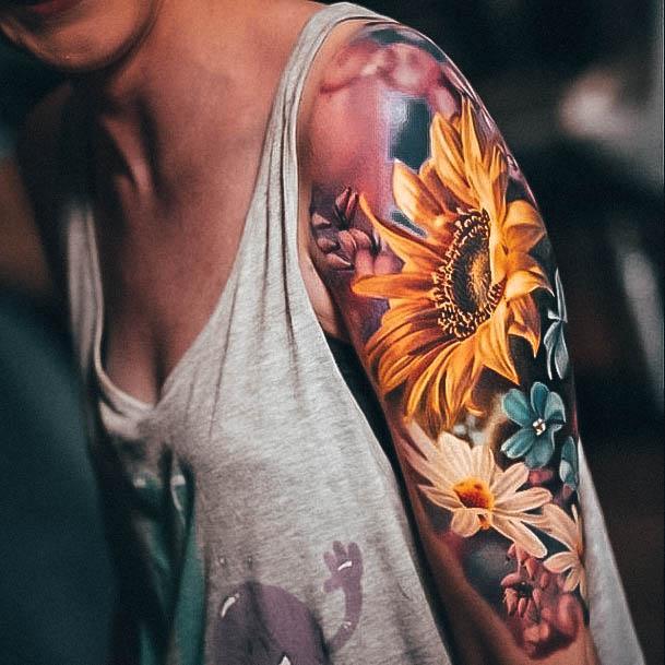 Decorative Flower Sleeve Tattoo On Female