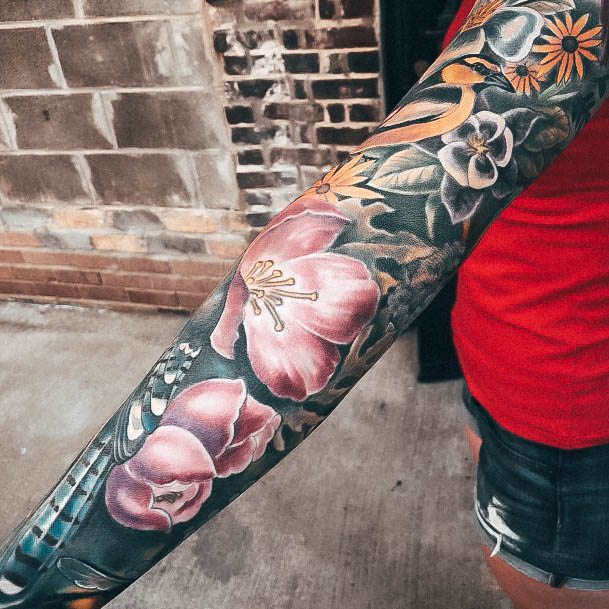 Decorative Full Sleeve Tattoo On Female