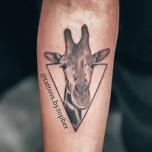 Decorative Giraffe Tattoo On Female Triangle