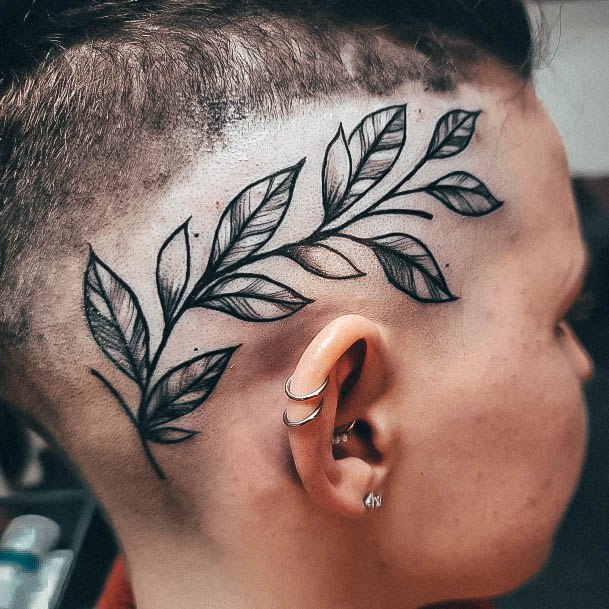 Decorative Head Tattoo On Female