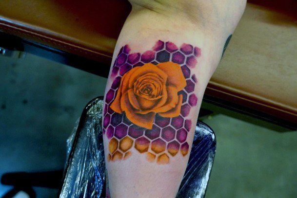 Decorative Honeycomb Tattoo On Female