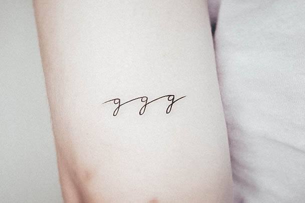 Decorative Initials Tattoo On Female