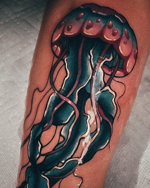 Decorative Jellyfish Tattoo On Female