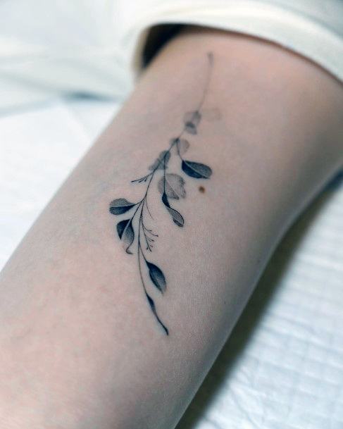 Decorative Leaf Tattoo On Female
