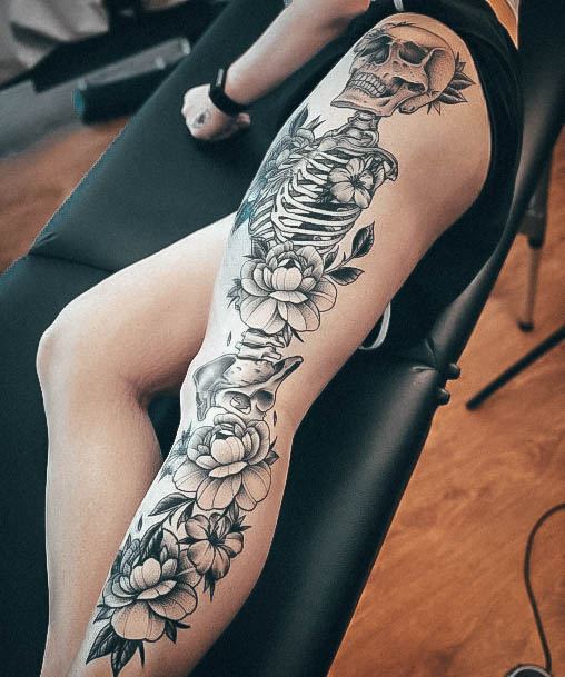 Decorative Leg Sleeve Tattoo On Female