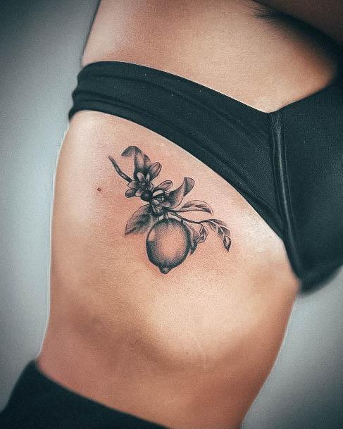 Decorative Lemon Tattoo On Female