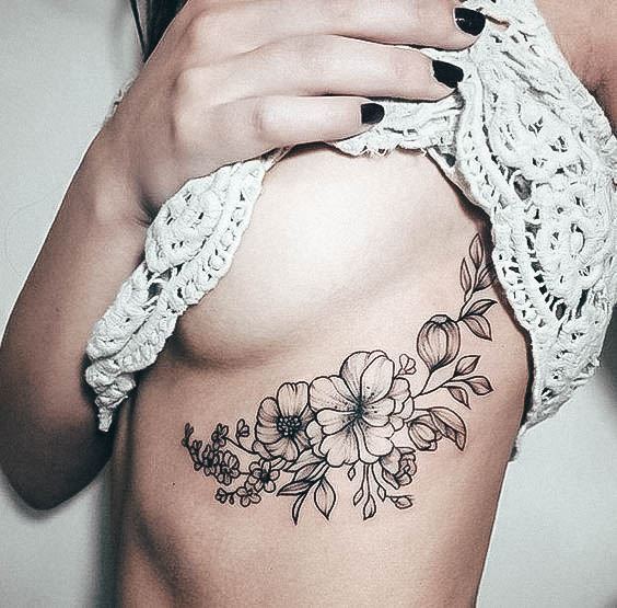 Decorative Looks For Womens Boob Tattoo