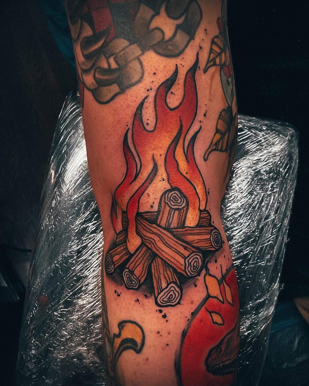 Decorative Looks For Womens Campfire Tattoo