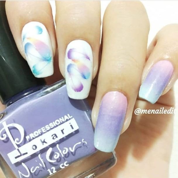 Decorative Looks For Womens Feather Nail