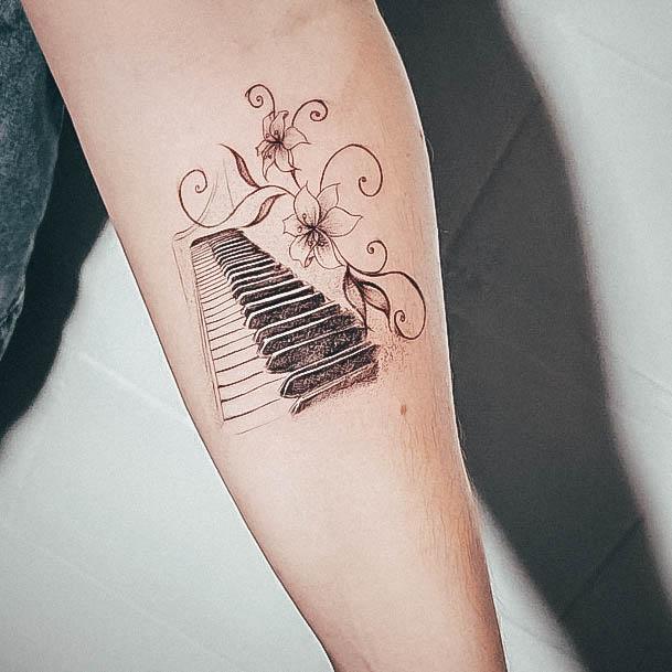 Decorative Looks For Womens Piano Tattoo