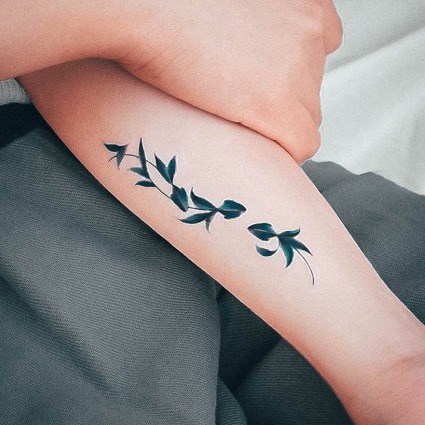 Decorative Looks For Womens Small Arm Tattoo