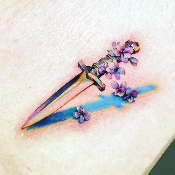 Decorative Looks For Womens Sword Tattoo