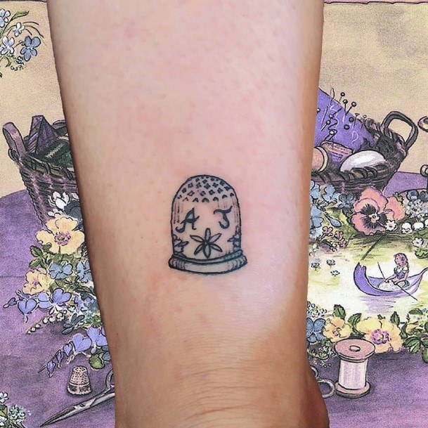 Decorative Looks For Womens Thimble Tattoo