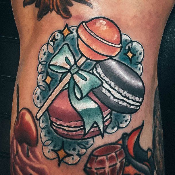 Decorative Macaron Tattoo On Female