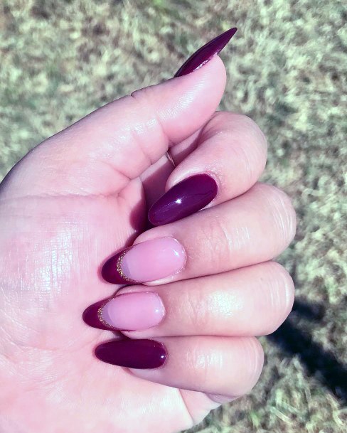 Decorative Maroon And Pink Nail On Female