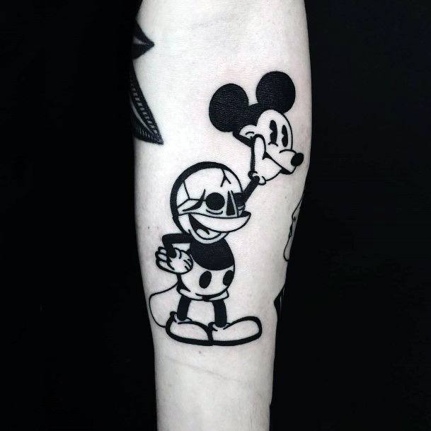 Decorative Mickey Mouse Tattoo On Female