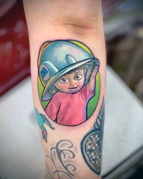 Decorative Monsters Inc Tattoo On Female