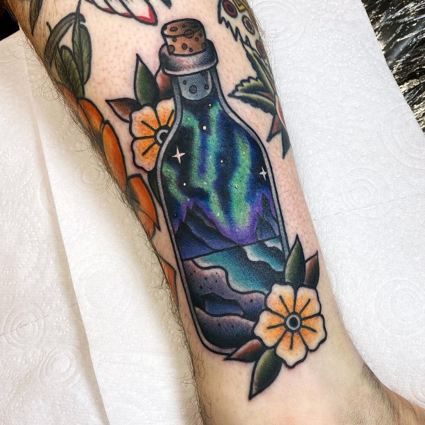 Decorative Northern Lights Tattoo On Female