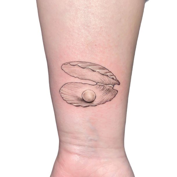 Decorative Oyster Tattoo On Female