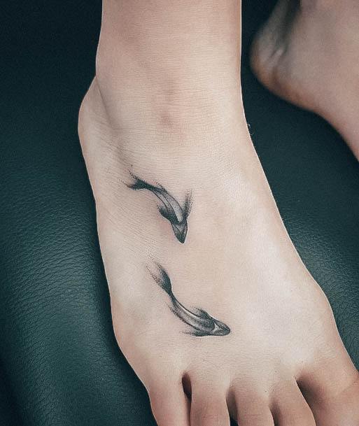 Decorative Pisces Tattoo On Female Foot