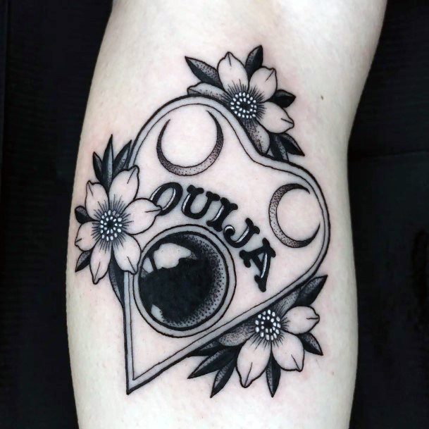 Decorative Planchette Tattoo On Female