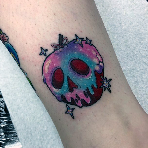 Decorative Poison Apple Tattoo On Female