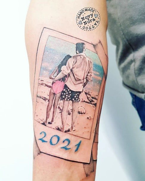 Decorative Polaroid Tattoo On Female